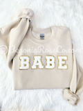 Chenille BABE patch crewneck sweatshirt in white with light pink chenille letters