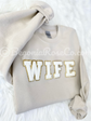 WIFEY crewneck sweatshirt lifestyle shot - cozy bridal shower gift sweatshirt