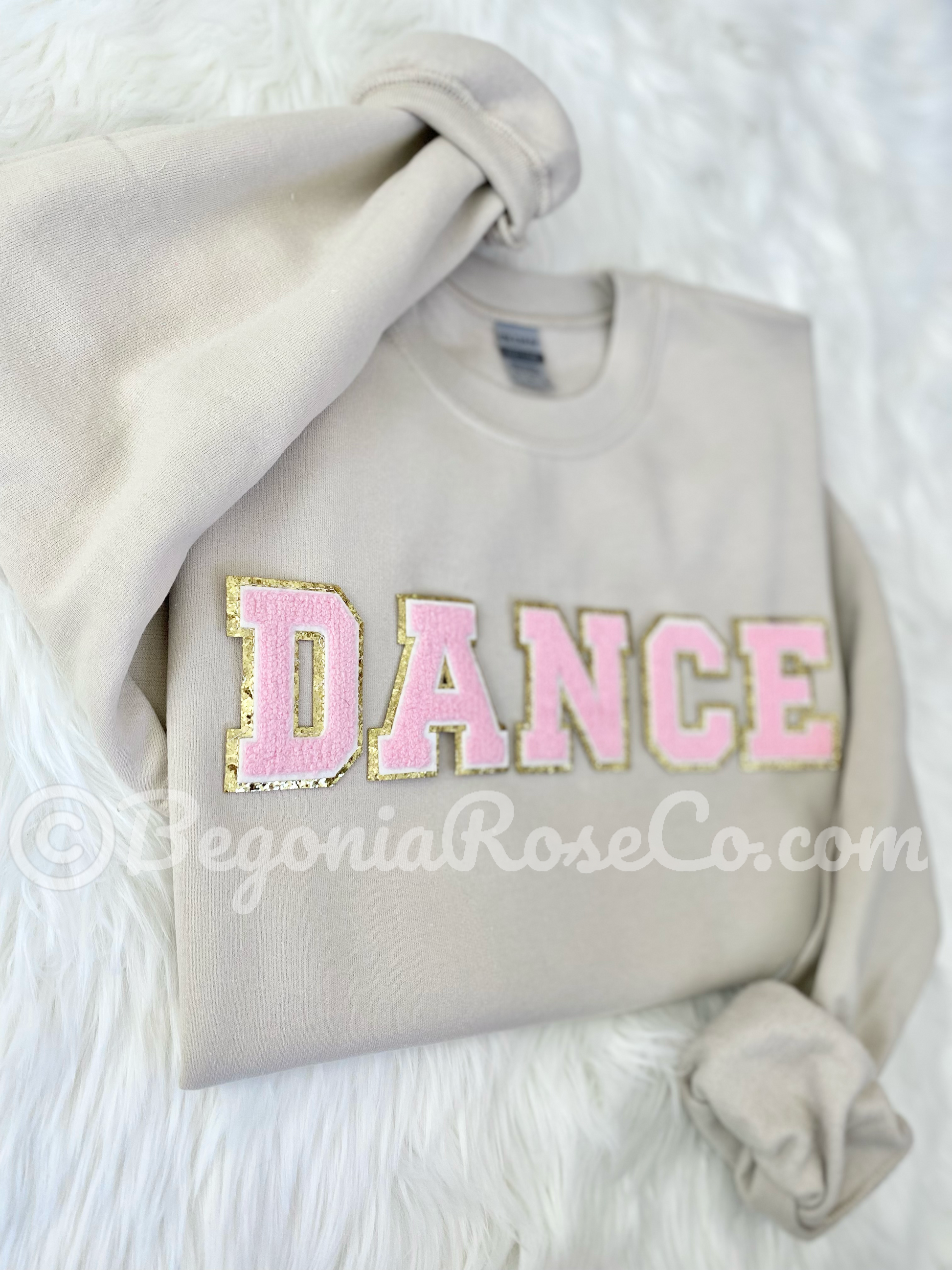 Chenille DANCE sweatshirt front view showing patch placement and elastic cuffs