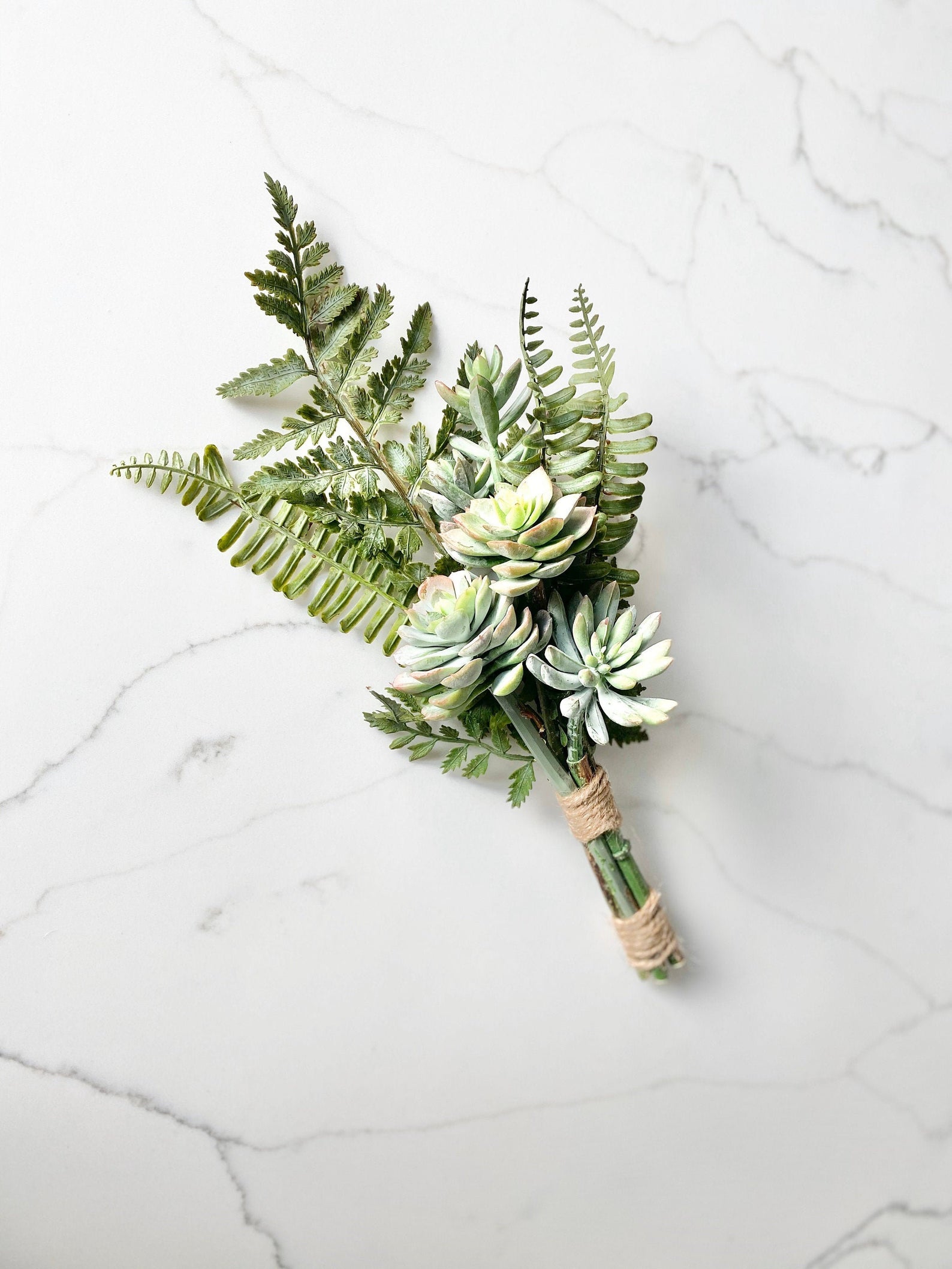 Boho faux succulent bouquet with mixed greenery and ferns for rustic weddings