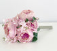 Artificial pink peony bouquet side view showing full width faux flower arrangement