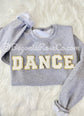 Model wearing DANCE chenille patch sweatshirt - dance teacher and dance friend gift
