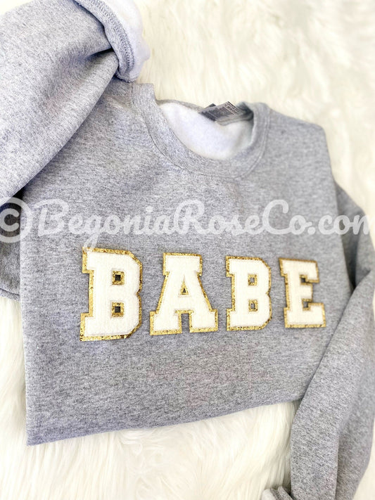 Model wearing chenille BABE patch crewneck sweatshirt - bachelorette and best friend gift