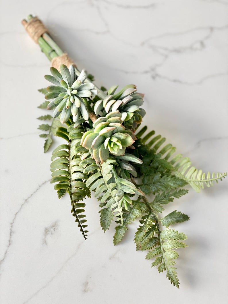 Artificial succulent bridal bouquet with twine wrap for boho and rustic weddings