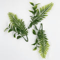 Set of 3 faux tropical greenery accents in green and dusty purple for boho floral designs