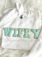 WIFE chenille patch sweatshirt in black close-up - anniversary Valentine's Day gift