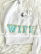 Model wearing WIFEY chenille patch crewneck sweatshirt - wife gift sweatshirt
